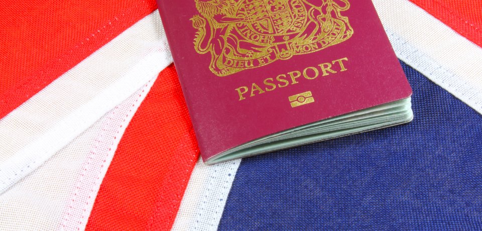 A passport on the Union Jack, UK flag